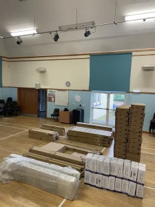 Interior of a School Hall with Unpackaged Equipment