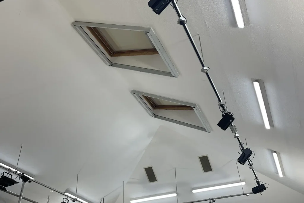 Close-up of School Hall Ceiling with Lighting Equipment