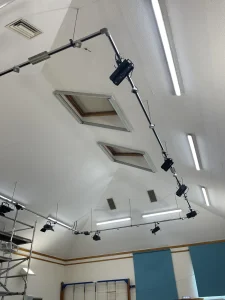 Close-up of School Hall Ceiling with Lighting Equipment