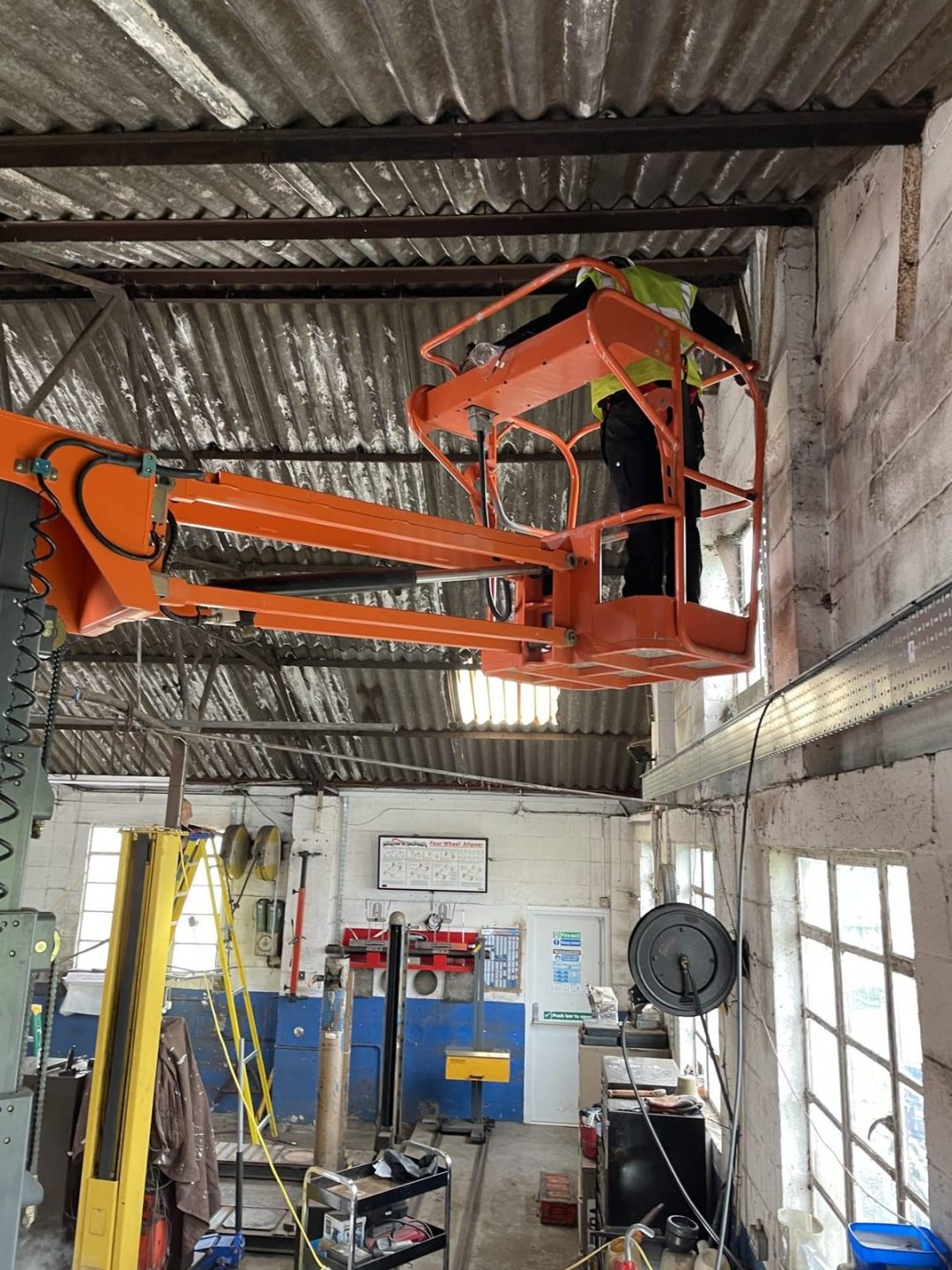 Interior of Bath Road Garage in Eastington with new 3-phase distribution board and containment installed by Stroud Electrical Services